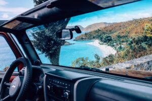 Enjoy the breathtaking beach view from a convertible on St John, U.S. Virgin Islands.