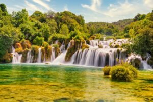 Explore the stunning cascades and lush greenery of Krka National Park's waterfalls in Croatia.