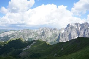 Scenic view of the Prokletije mountains under a vibrant blue sky in Lëpushë, Shkodër County, Albania.